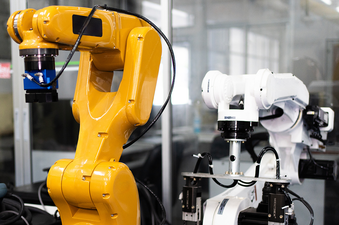 A photo of two robotic machines.