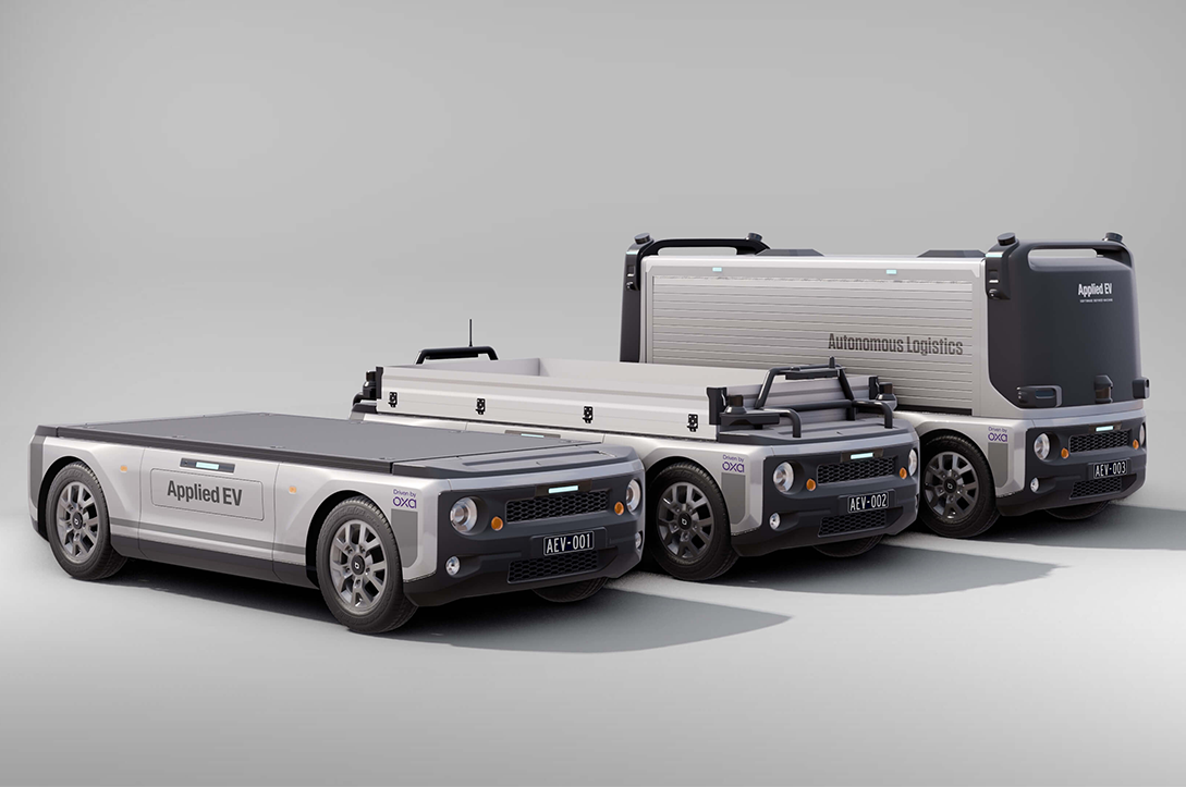 A photo of three of Applied Electric Vehicles' autonomous vehicles.