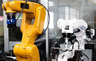 A photo of two robotic machines.