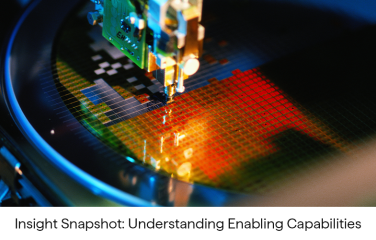 A graphic of a machine manufacturing a computer component.