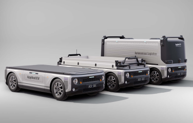 A photo of three of Applied Electric Vehicles' autonomous vehicles.