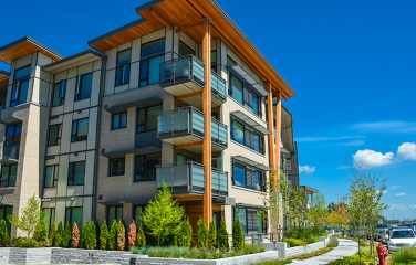 A photo of a mid-rise apartment building.